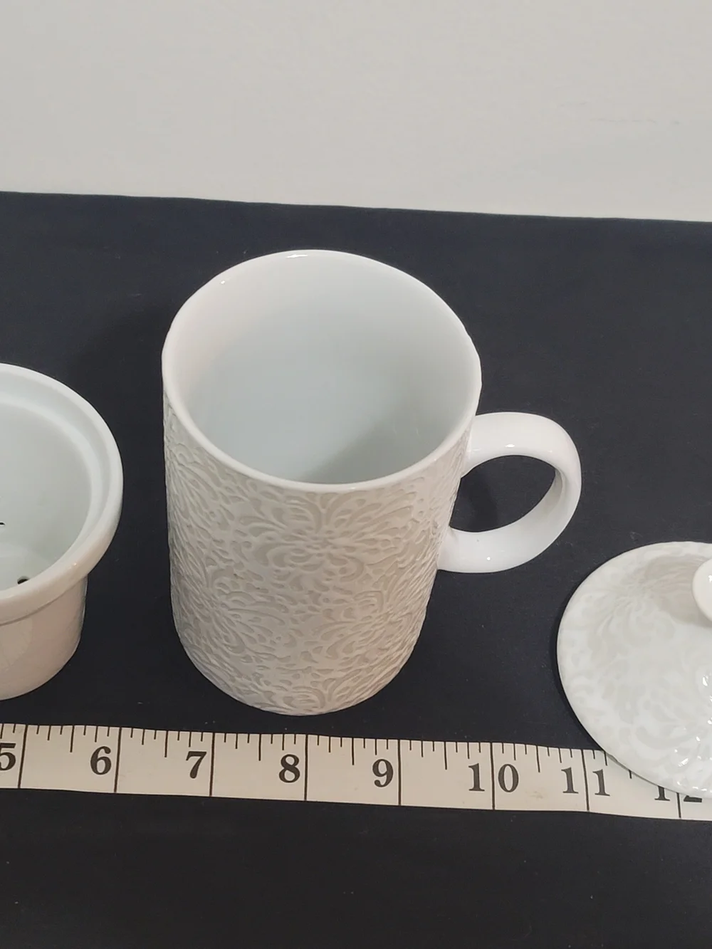 Cost Plus World Market White Embossed Ceramic Tea Strainer Mug with Lid